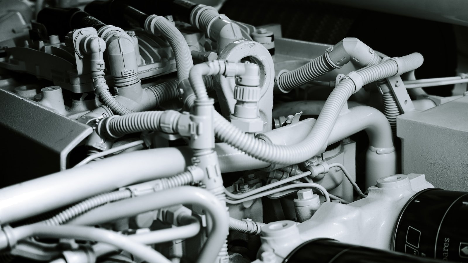 grayscale photography of vehicle engine