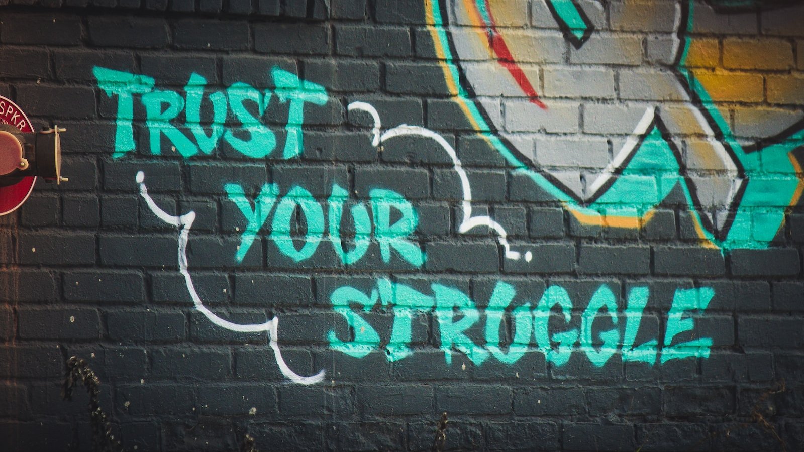 green trust your struggle graffiti