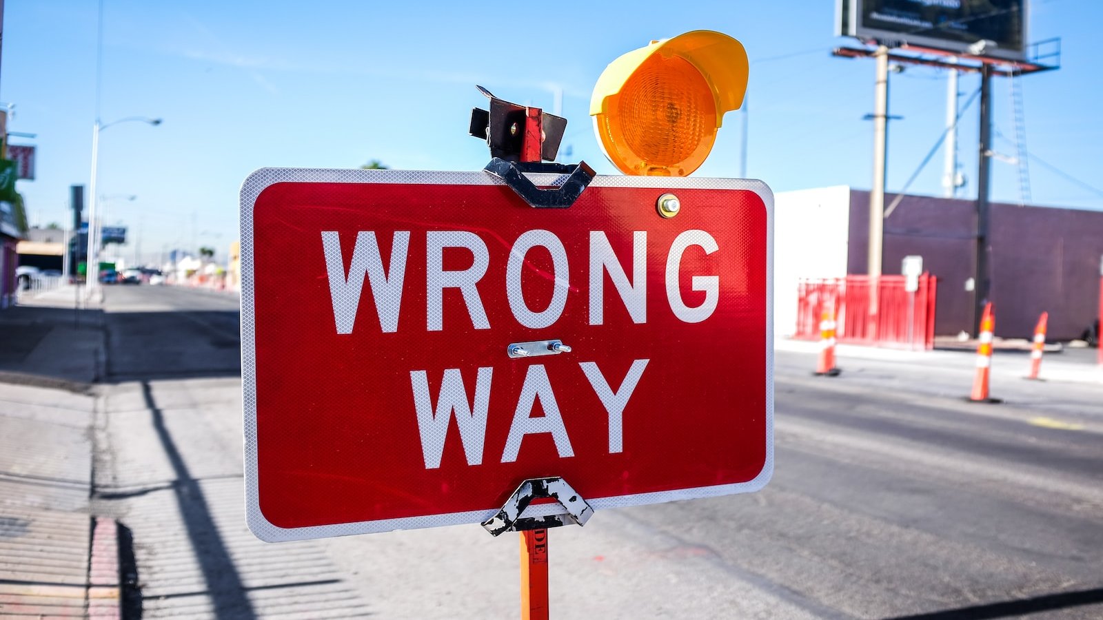 red Wrong Way signage on road