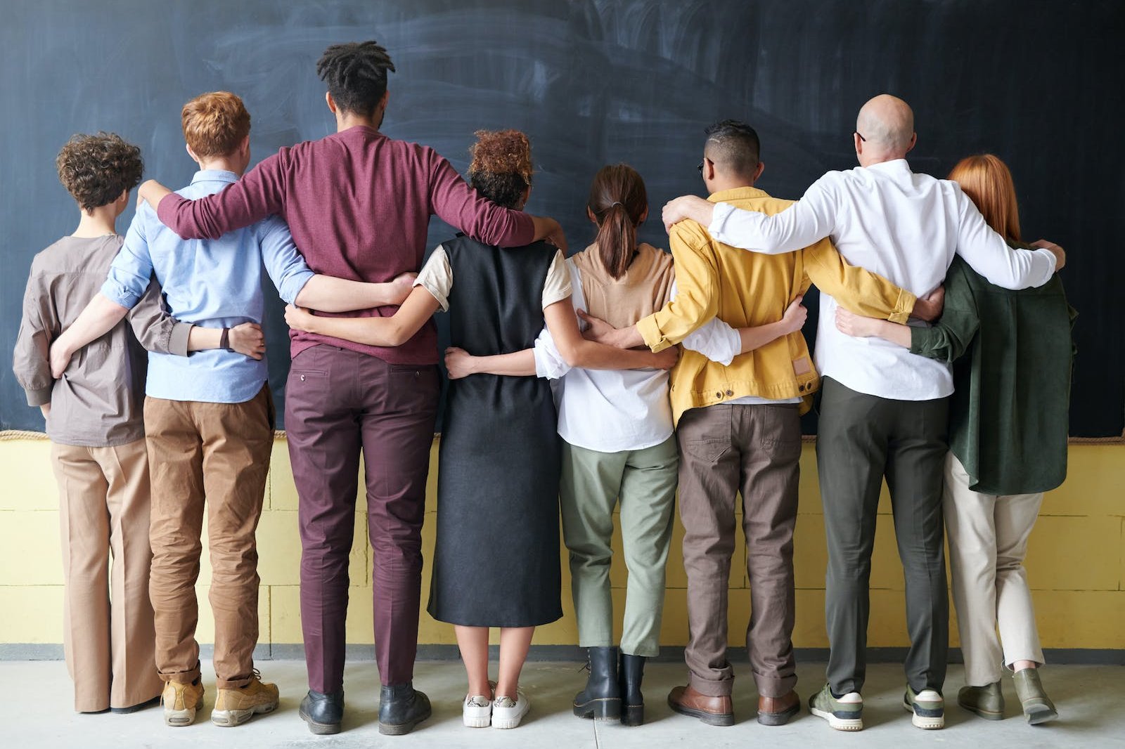 Group of People Standing Indoors