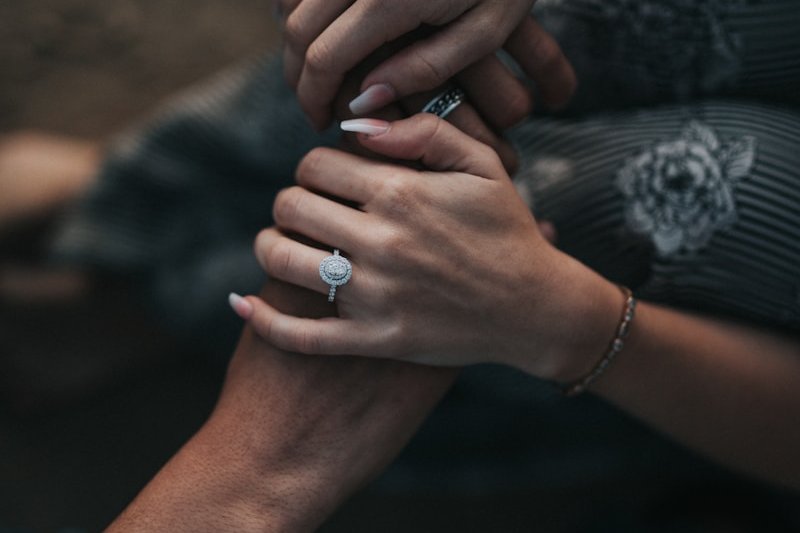 man and woman holding each others hands