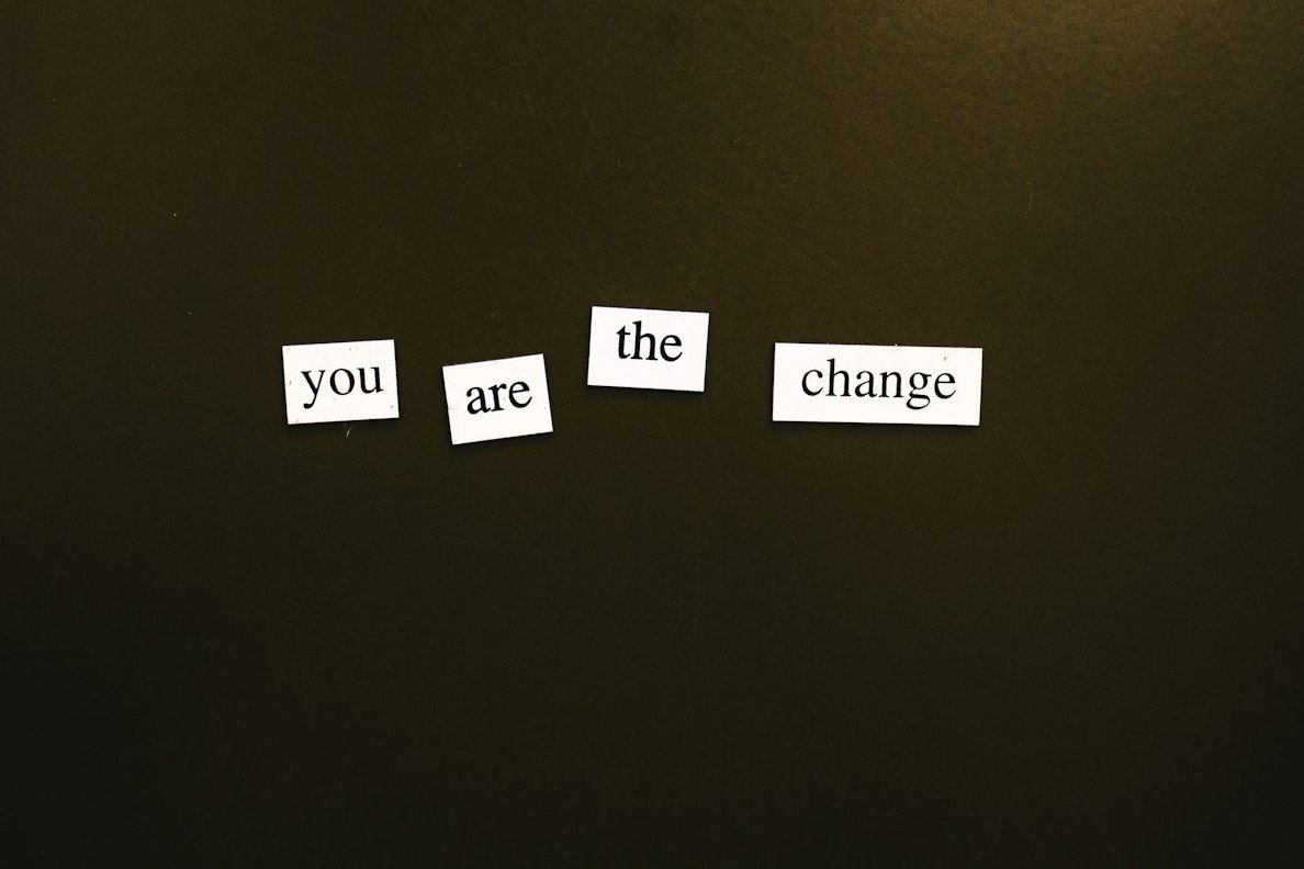 a refrigerator door with magnets that say come, the change, and come