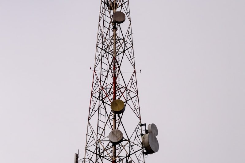 orange and white tower crane