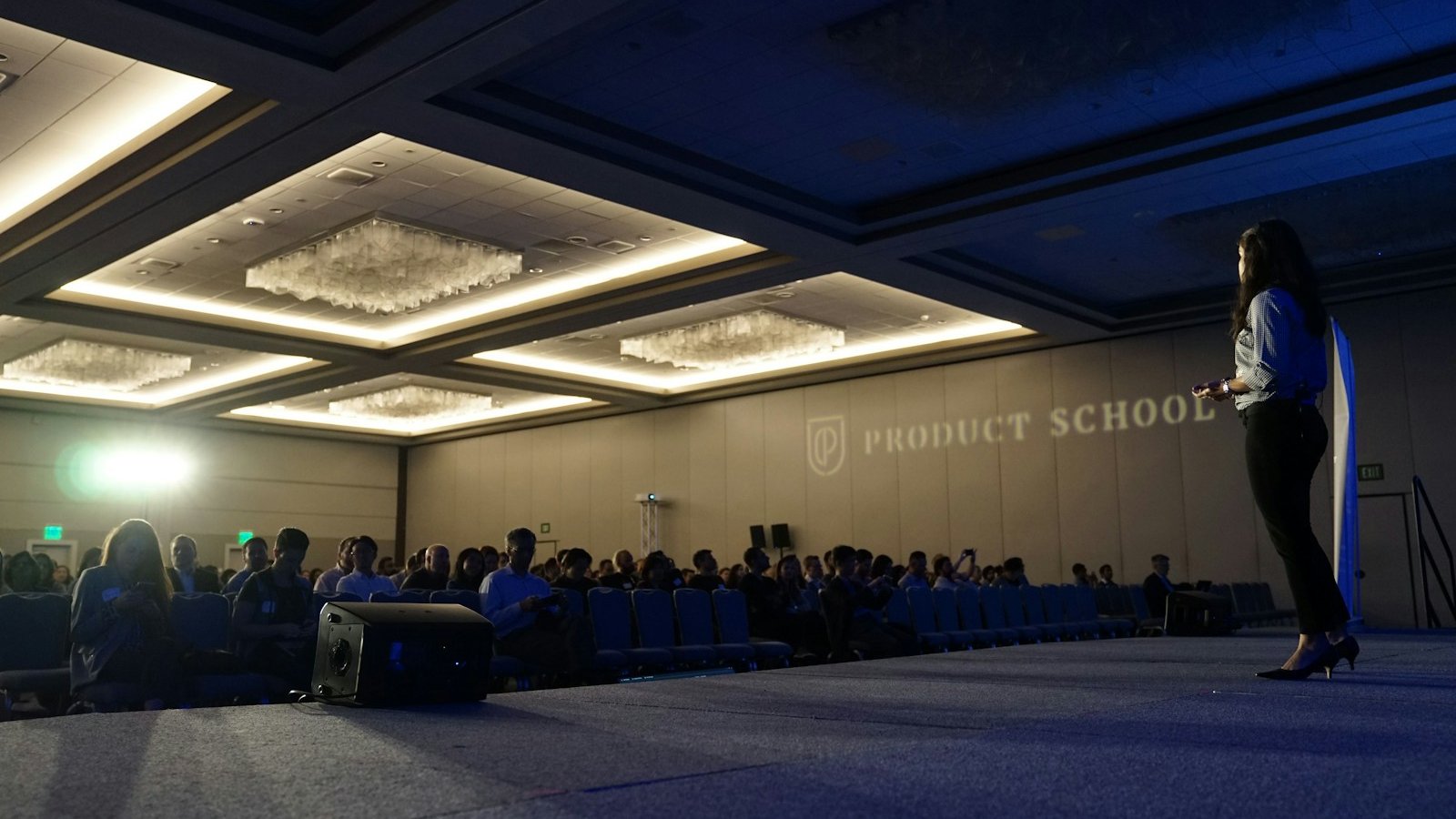 woman standing on stage