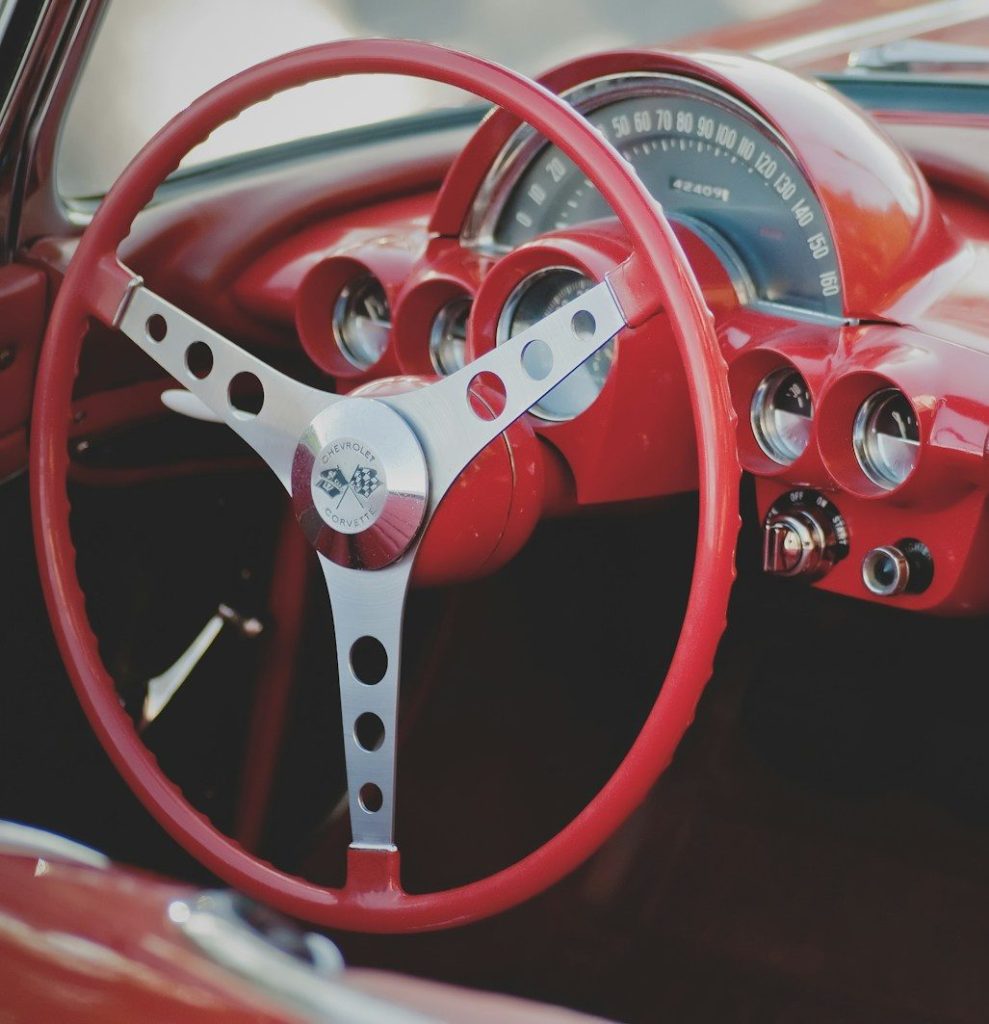 closeup photo of car steering wheel