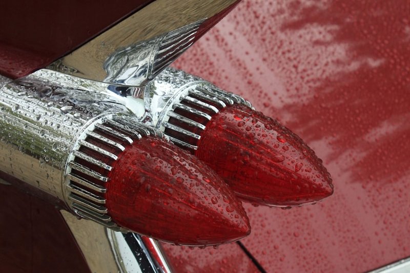 red and gray vehicle close-up photography